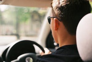 man driving car man driving car